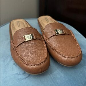 Brown Giani Bernini loafer flats.